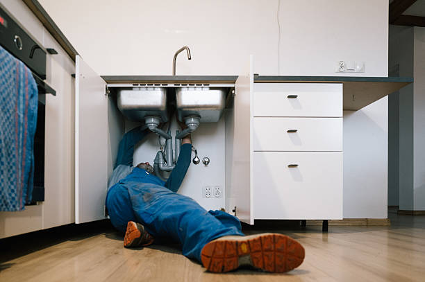Professional Plumbing technician working in Pleasant Hill, MO